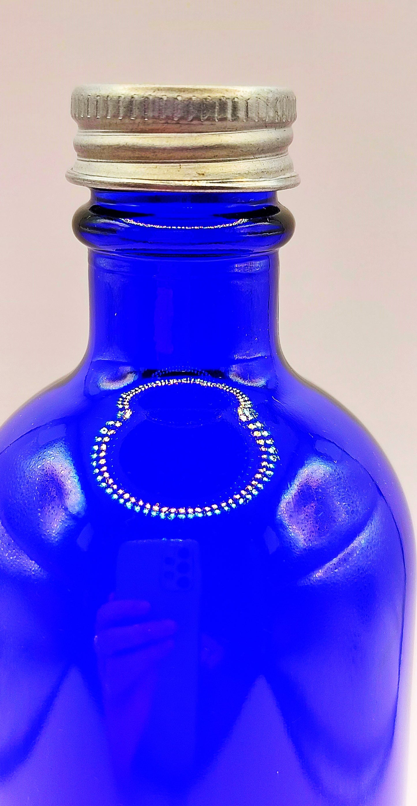 FLACON VERRE BLEU 100ML + CAPSULE