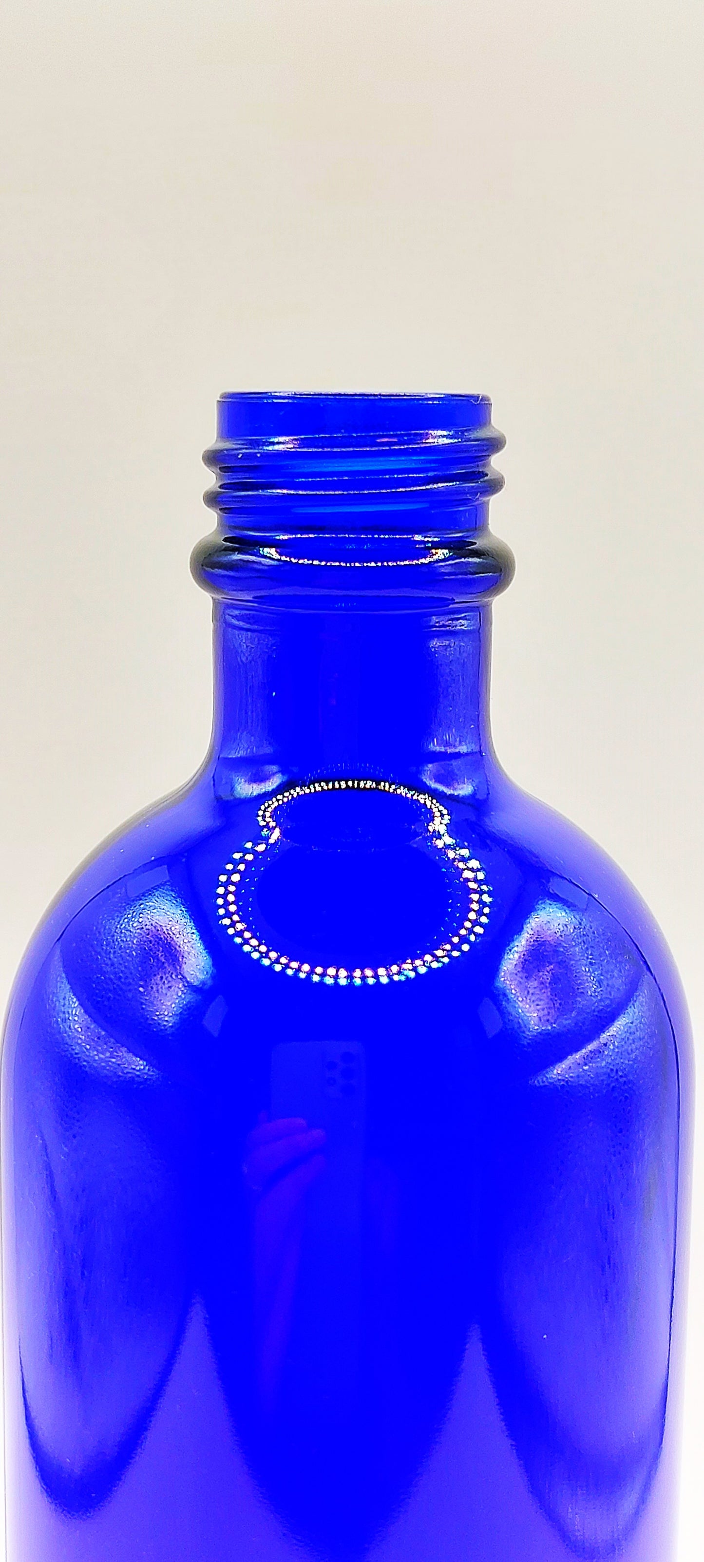 FLACON VERRE BLEU 100ML + CAPSULE